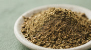 Close-up of finely ground herbal powder in natural earthy tones
